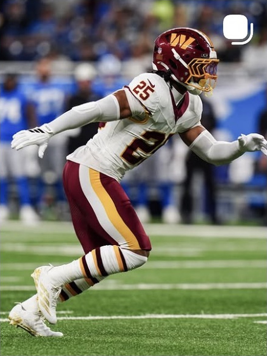 Nick Cross in the white road uniform during a game at Detroit