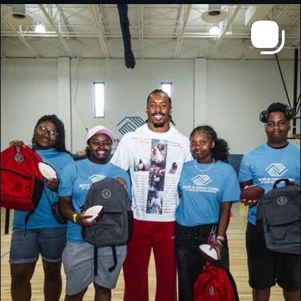 Nick Cross hosting a Boys & Girls Club backpack giveaway